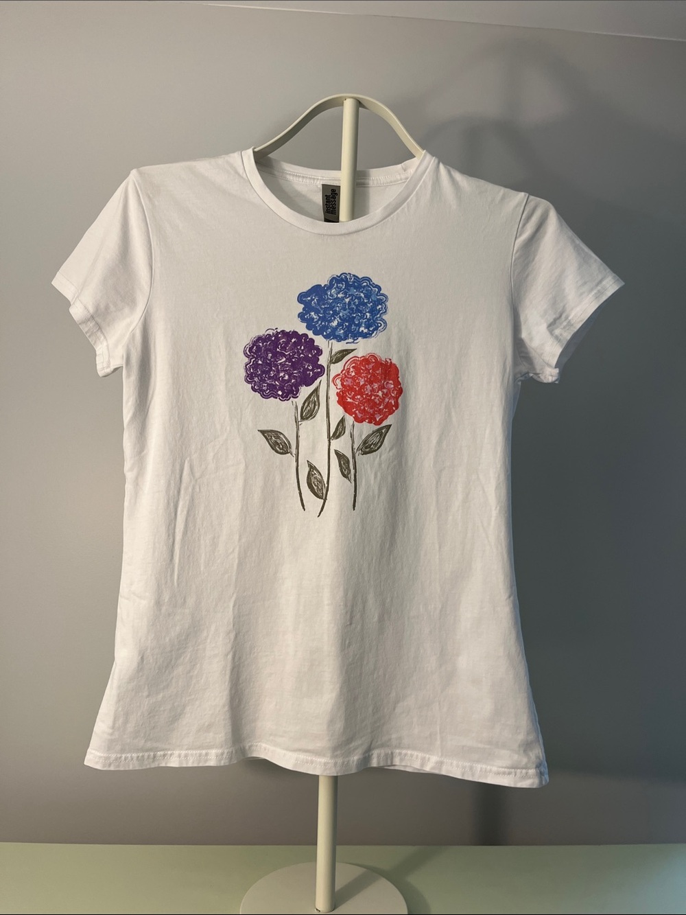 Women’s White Floral Graphic Tee with Red, Blue & Purple Blooms